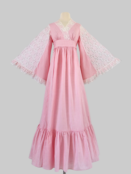 1970s pink gingham prairie-style maxi dress featuring lace angel sleeves.
