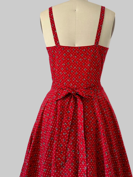 1970s Gunne Sax cherry red prairie dress with lace trim, button front, and full skirt.