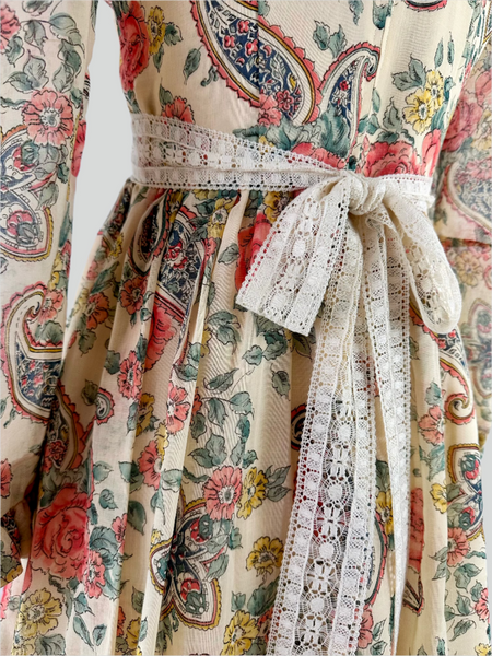 Floral and paisley patterned vintage dress with lace trim