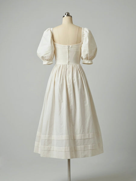 1980s Laura Ashley antique white cotton midi dress with pintucked bodice, puff sleeves, square neckline and full skirt, made in Great Britain