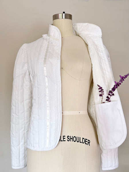 1907s Vintage Gunne Sax white quilted jacket with lace trim and a high neck