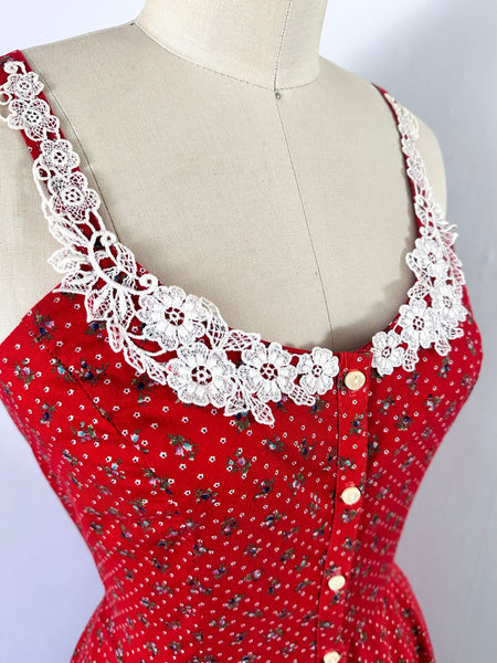 1970s Gunne Sax cherry red prairie dress with lace trim, button front, and full skirt.