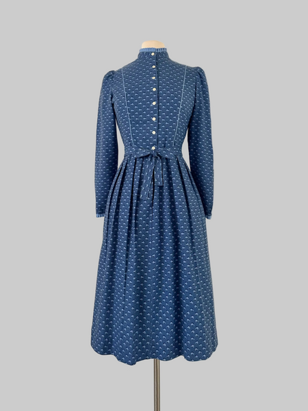 Vintage 1980s Lanz Originals cotton mid-length dress in soft blue with an allover floral print, featuring long sleeves and a belted waist