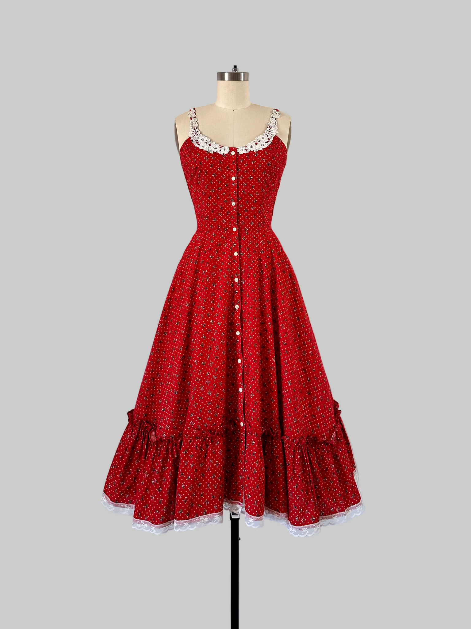 1970s Gunne Sax cherry red prairie dress with lace trim, button front, and full skirt.