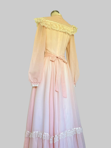 The Romantic Renaissance Bridal Collection by Gunne Sax (designed by Jessica McClintock) features vintage 1970s and 1980s floor-length gowns and dresses inspired by Victorian, Edwardian, and Renaissance style. Peach color