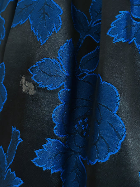 close-up of small fabric mark on skirt of vintage S.G. Gilbert