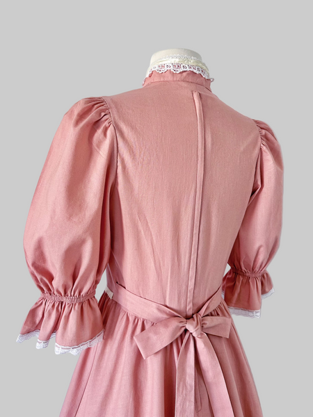 Back view of 1970s Gunne Sax midi dress with puff sleeves, pearl bead trim, and faux pearl buttons 